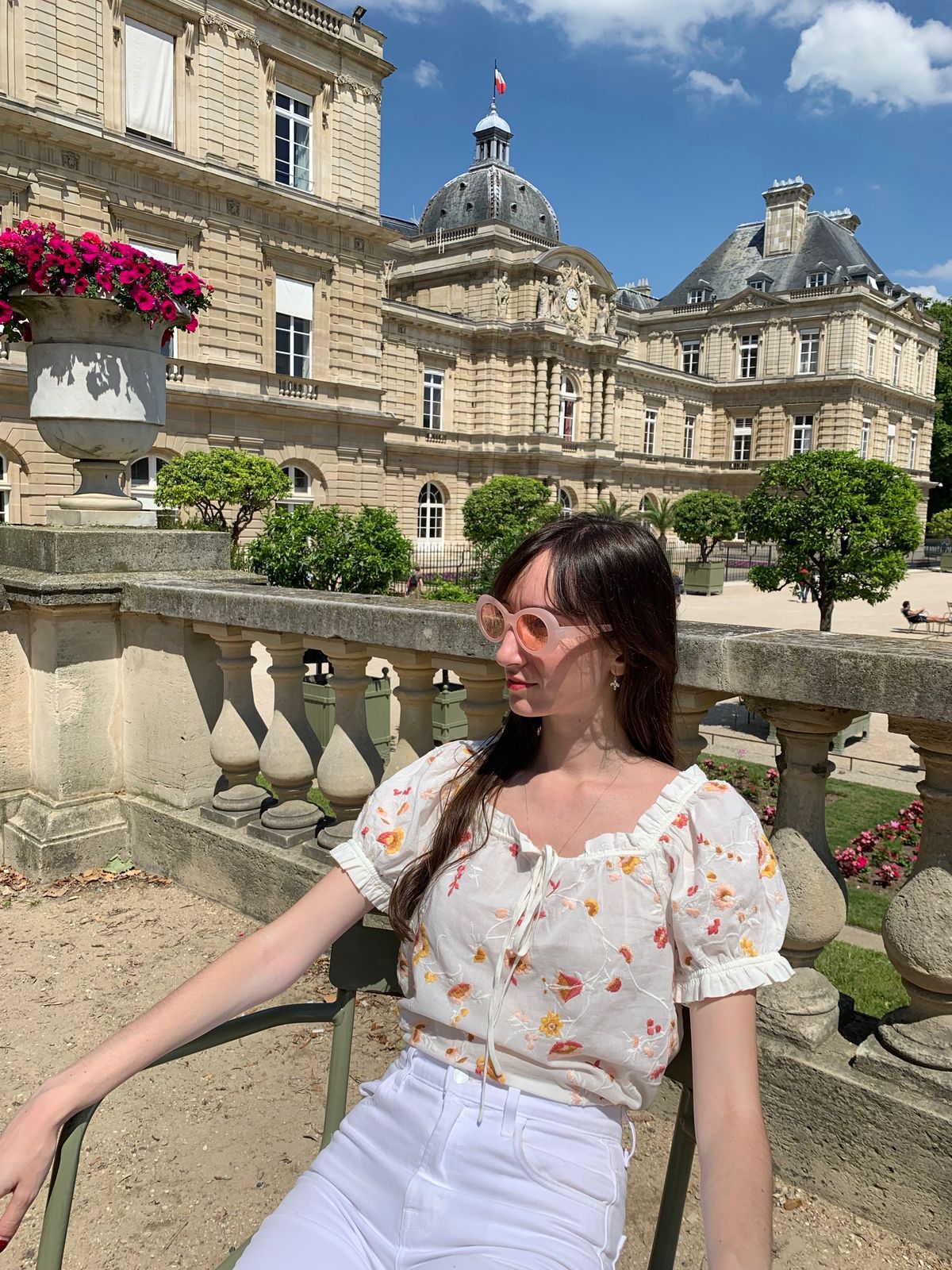 Sézane top, J brand white jeans at Jardin du Luxembourg